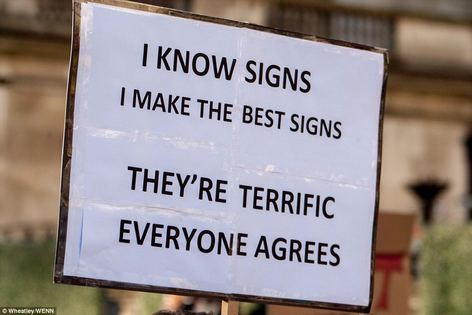 3C5CA3FE00000578-4143964-London_Somebody_held_up_a_sign_mocking_the_way_Trump_speaks_in_p-a-50_1485062239254.jpg 3C5CA3FE00000578-4143964-London_Somebody_held_up_a_sign_mocking_the_way_Trump_speaks_in_p-a-50_1485062239254.jpg
