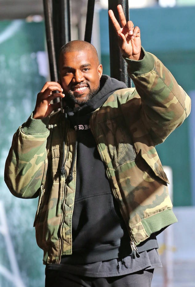 rs_634x932-160405165502-634.Kanye-West-Peace-Sign-LA.ms_.040516.jpg