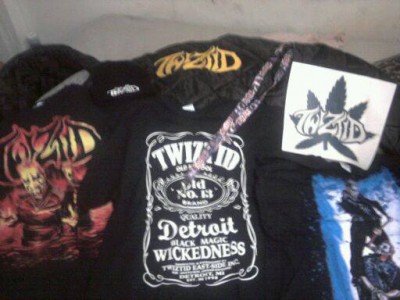 This is the package I (and other FLH staff members) received from Twiztid. The jacket is the very top and center piece of merch. Sorry for the blurred pic, but this is the only picture I have. I currently have no camera.